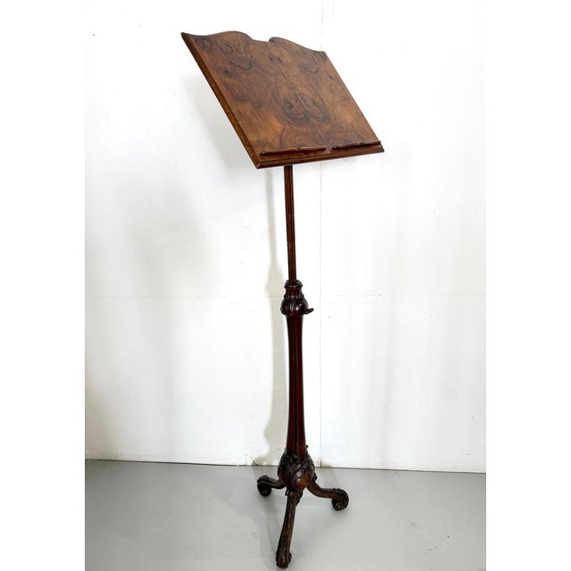 Made in Italy, 1950s- 1960s. This adjustable music stand /book stand is made of hand-carved walnut with a 19th century...