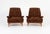 A striking pair of mid-century modern lounge chairs by Heritage, featuring sculptural silhouettes, generously proportioned...