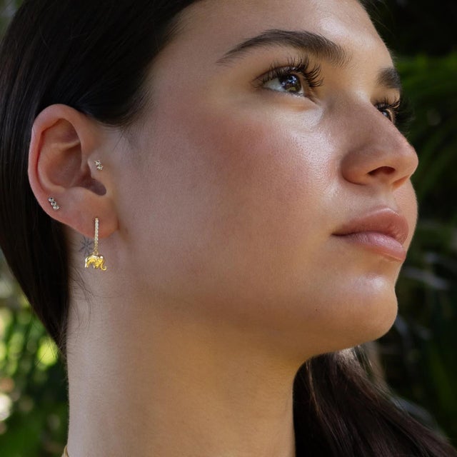 Dainty Gold Lucky Elephant Earrings Carry the timeless energy of wisdom, protection, and good fortune wherever you go with...