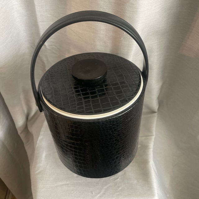 Vintage 1960s Mid-Century Modern ice bucket by Shelton Ware. The exterior features a black faux alligator or crocodile...