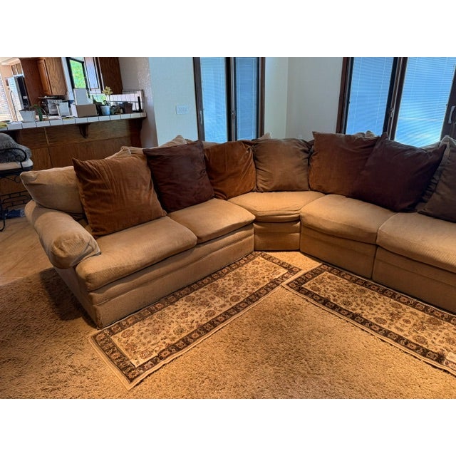Purchased in 2002, this 4-piece sectional consists of two 2-seat sections, a single seat section and a corner section....