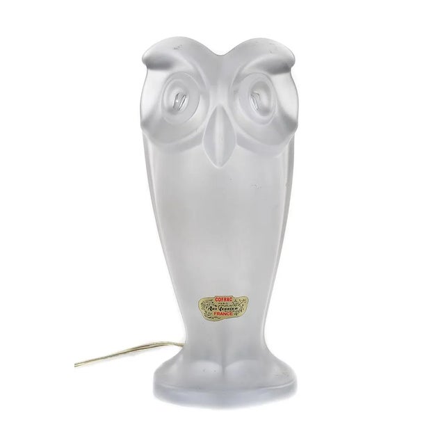 A pair of high quality French 1960's table lamps modeled as Owls birds; labeled Cofrac, Paris, Art Verrier, Made in...