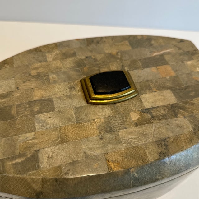 C.1970s Stunning Maitland-Smith gray variegated tessellated stone box with a brass mounted onyx cabochon mounted to the...