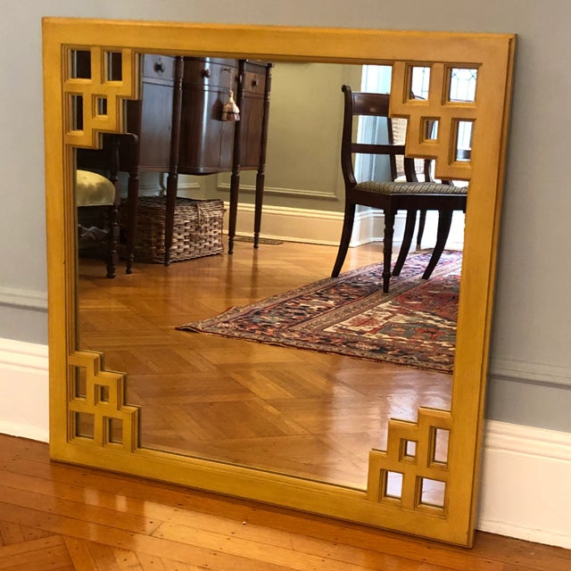 Offering a large and very beautiful Asian-style wall mirror from the mid-20th century. It features elegant geometric...