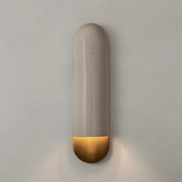 Beautiful sconce from Emmanuelle Simon crafted using Raku, an ancient Japanese ceramic technique. The thermal shock...