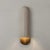 Beautiful sconce from Emmanuelle Simon crafted using Raku, an ancient Japanese ceramic technique. The thermal shock...