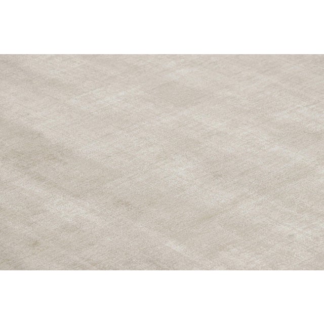 This 11x19 contemporary rug is the newest addition to the Rug & Kilim Textural Collection, with an inventive take on solid...