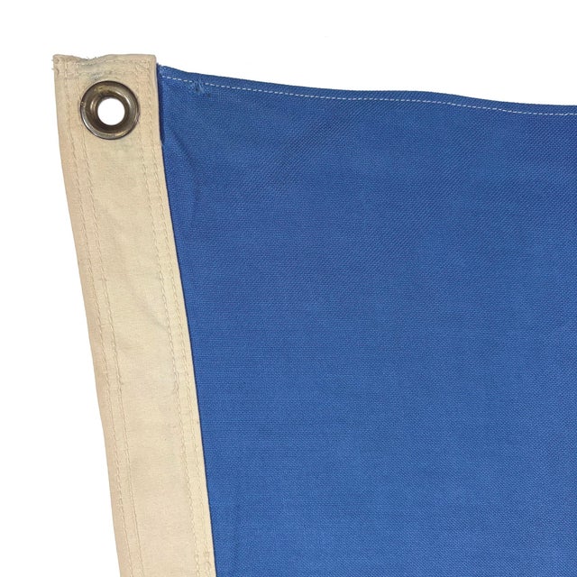 This vintage Oklahoma flag is made from a cotton cloth with printed emblem visible from both sides. Please note staining,...