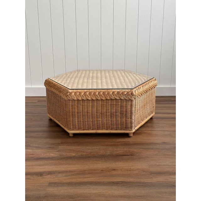 A rare sculptural braided wicker coffee table by Brown Jordan, designed with the geometry and warmth that defined late...