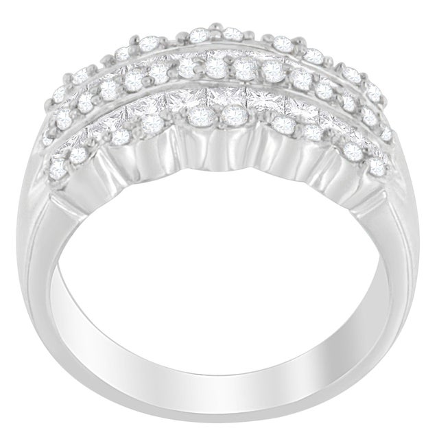 Modern design, multi-row 14KT white gold ring with gorgeous round- and princess-cut natural diamonds. This style is sure...
