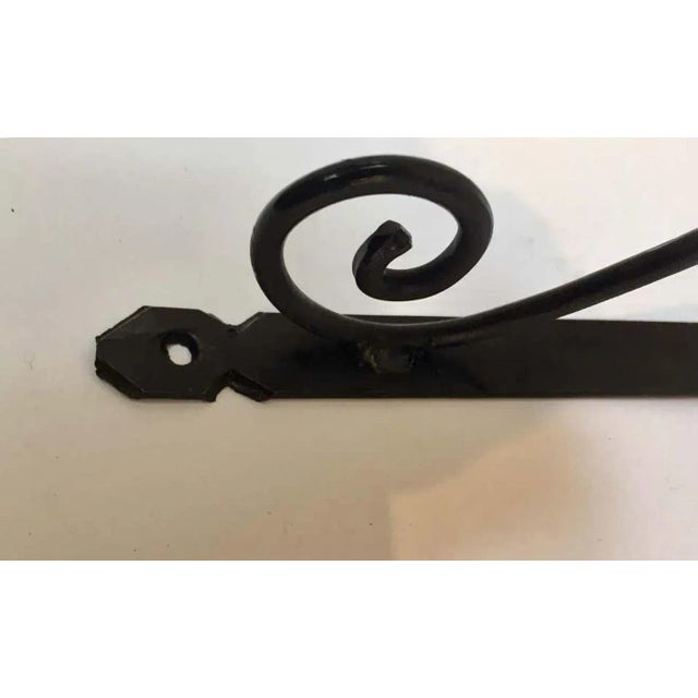 Beautiful hand crafted iron scroll design wall bracket. Wrought iron handcrafted wall-bracket for lanterns or signs....