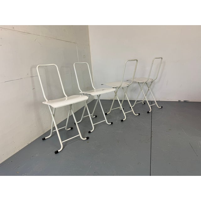 Set of 4 vintage White Italian folding chairs in the manner of Gastone Rinaldi, Dafne chairs, 1980s Chairs are in a good...