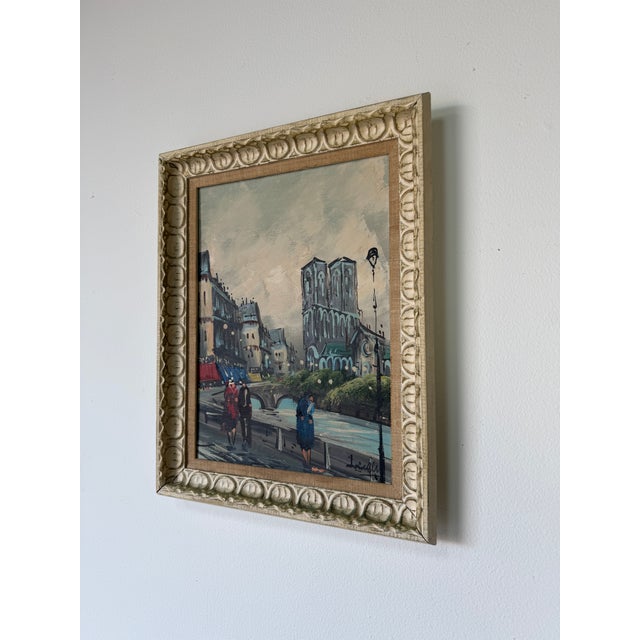 Charming Vintage Impressionist oil painting on Masonite board depicting a classic Parisian street scene, featuring...