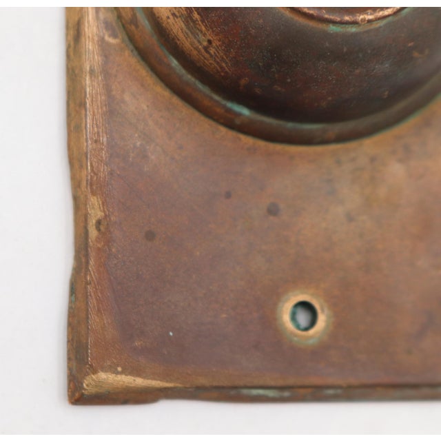 Vintage brass doorbell plate with a single button cutout. The original mounting screws are not available. Good condition...