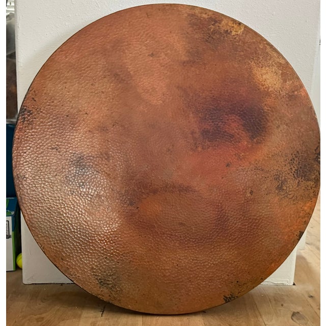 Beautiful 2 in wide iron scrolled dining room base. It is quite heavy. The top is a fired copper top table. It is 36...