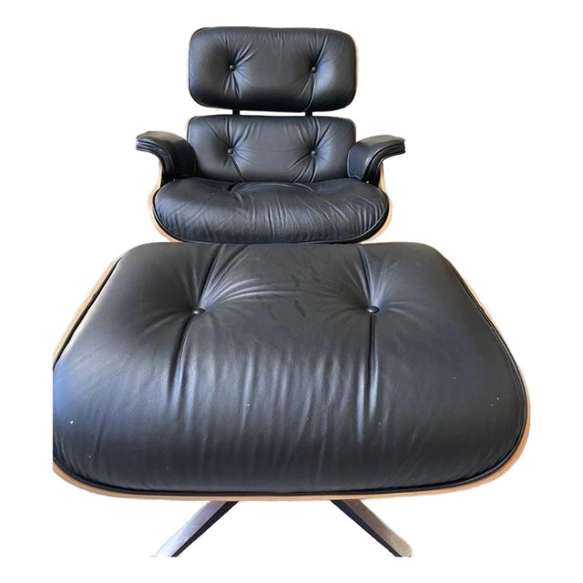 2014 Herman Miller Eames Lounge Chair and Ottoman | Walnut & Black Leather For Sale