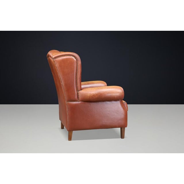 Patinated Cognac Leather Wingback Lounge Chair, Netherlands, 1960s For Sale - Image 11 of 13