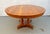 Elegant Stickley expanding dining table crafted in beautiful cherry, featuring a graceful oval top, rich warm finish, and...