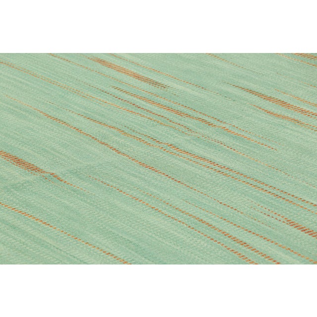 Handwoven in wool, this 6x9 Kilim is from an inventive new contemporary flat weave collection by Rug & Kilim. On the...