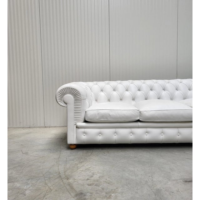 The Story A true masterpiece of Italian craftsmanship, this authentic Poltrona Frau Chester sofa represents the pinnacle...