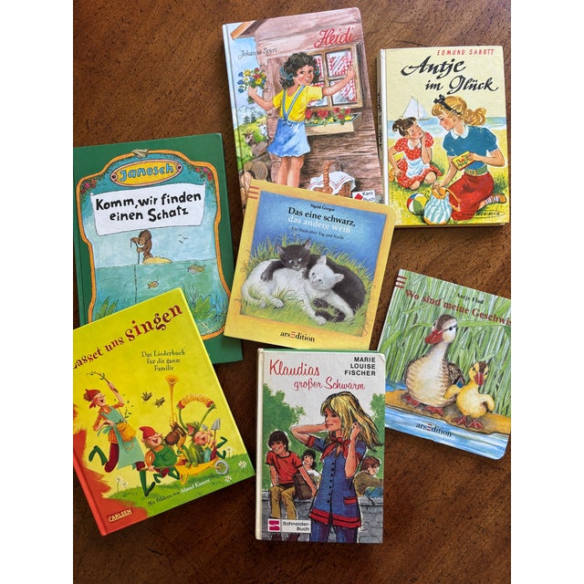 Bring a charming, global heritage feel to a nursery, playroom, or boutique bookshelf with this beautifully curated...