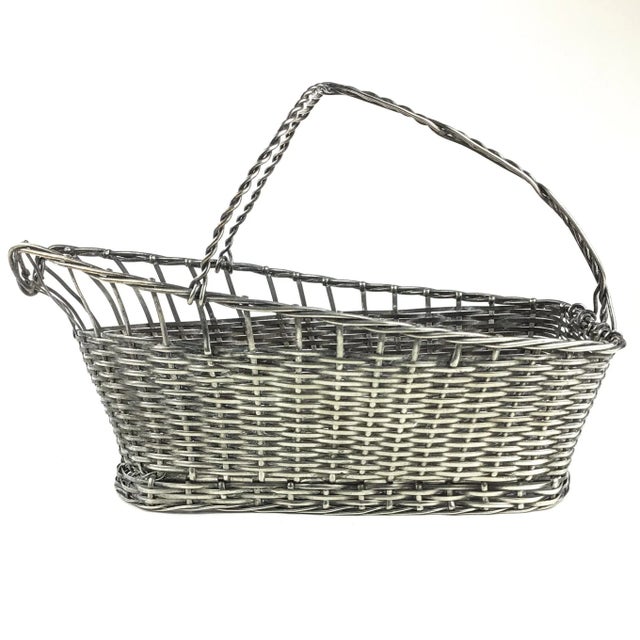 This basket is very sturdy and strong. It’s only flaw is that it has been left to tarnish a bit but it still looks great....