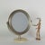 Tilting table mirror in metal and marble. This piece is attributed to the mentioned designer/maker. It has no attribution...
