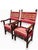 Pair of walnut armchairs, Lombard production, with carved panel and grooves that reach the legs from the armrests. Every...