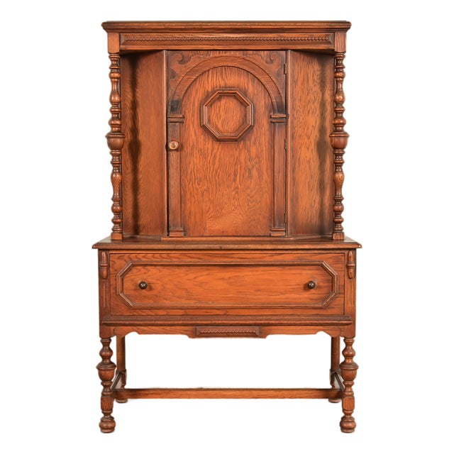 Antique English Jacobean Carved Oak Bar Cabinet, Circa 1920s For Sale