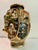 This is a stunning Japanese Satsuma Vase depicting the Immortals of Japan, with raised figures in gold and hand painted...