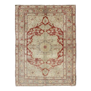 Fine Turkish Oushak Rug With Centre Medallion in Light Red and Ivory For Sale