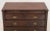 American Empire Mahogany Chest of Drawers, 19th century, having two short drawers above three graduate frieze drawers on...