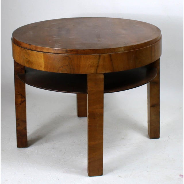 This is a beautiful round Art Deco coffe table. It is in opriginal condition, the original owner took great care of it. It...