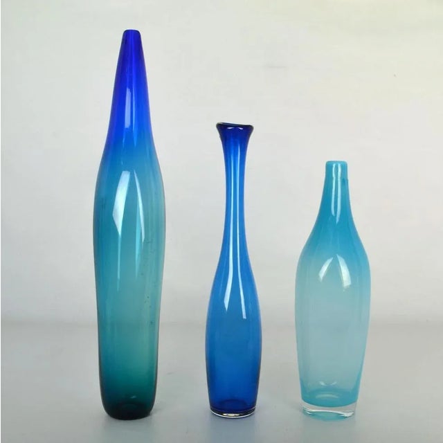 Set of three blue vases by Floris Meydam and Siem van de Marel is the designer at Leerdam glass works, The Netherlands....
