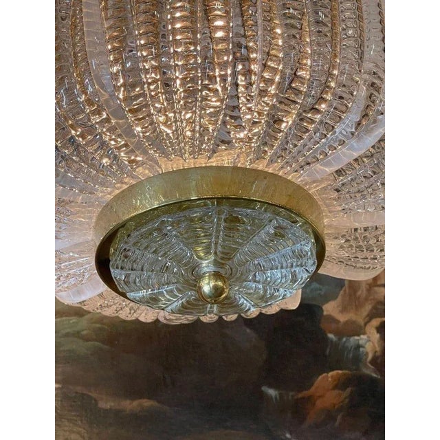 Fine quality modern Murano glass and brass lanterns. Circa 2000. The chandelier has been professionally re-wired, cleaned...