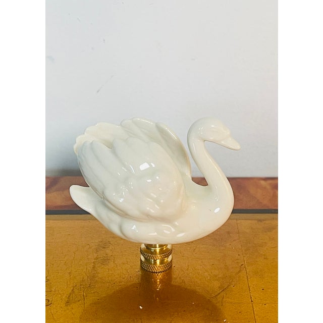 Vintage German porcelain Goebel swan figurine mounted on brass base as lamp finial.