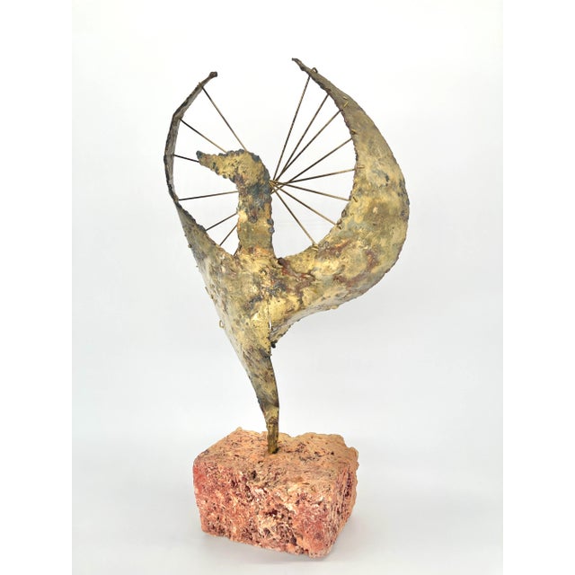 Brutalist mid century metal phoenix sculpture in the manner of Curtis Jere. Raw shape of the phoenix teeters on a lava...