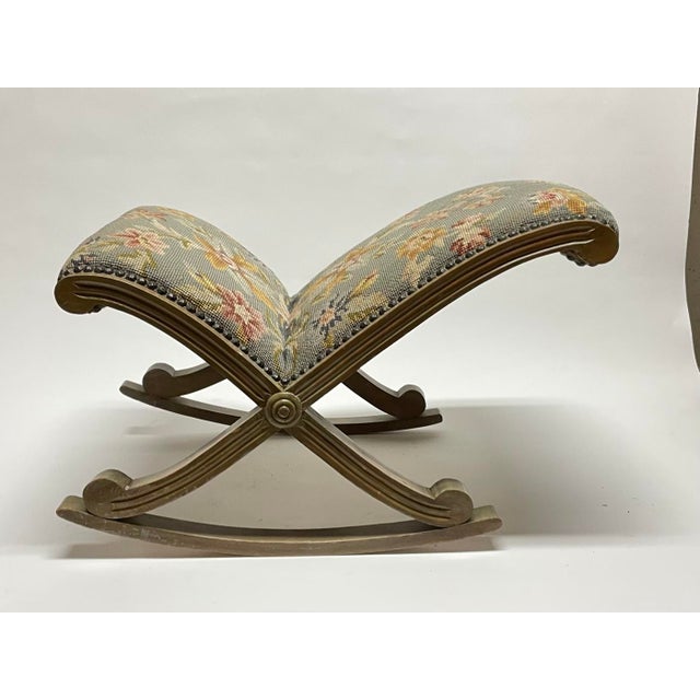 Victorian era “gout stool” or footstool—designed to cradle and rock painful feet—made from solid birch, needlepoint floral...