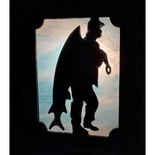 A vintage wall light, sconce with a fishing theme. The lamp looks circa 1940-1950s or so and was recently repainted. It...
