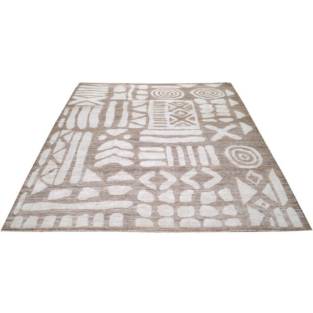 Moroccan Hand-knotted with care using traditional rug-making techniques, this wool rug blends timeless craftsmanship with...