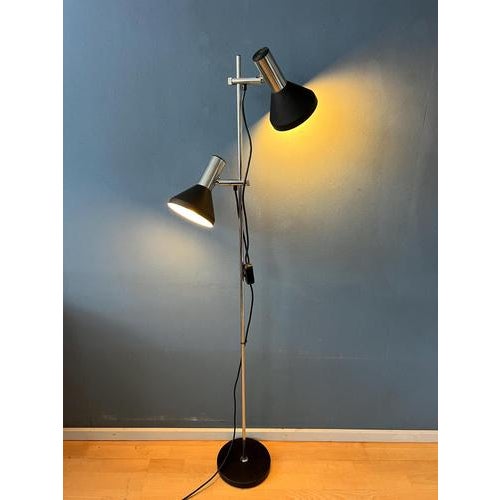 Mid century floor lamp with chrome frame and black adjustable spots with aluminium front. The lamp requires two E26/27...