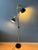 Mid century floor lamp with chrome frame and black adjustable spots with aluminium front. The lamp requires two E26/27...