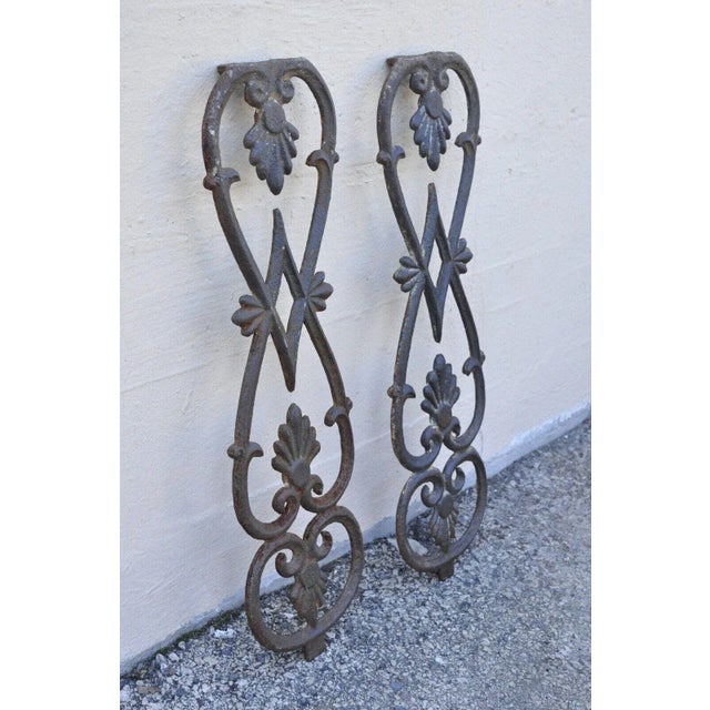 Antique Victorian Cast Iron Gate Supports Architectural Elements - a Pair. Item features cast iron construction, ornate...