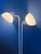 Uniquely shaped white vintage space age floor lamp with two acrylic glass shades. The acrylic glass shades produce a warm...