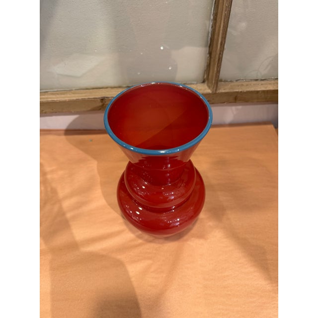 This is a vintage Studio Paran vase. It was made by Richard Jones. It is hand blown glass art. The origin of the company...