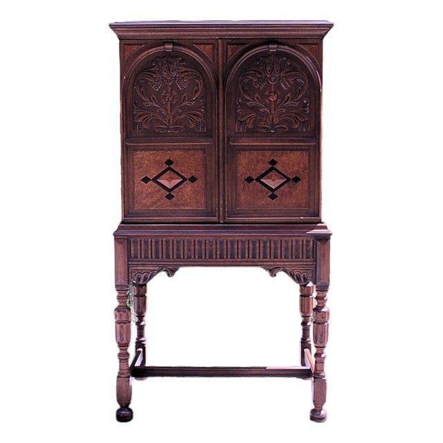 1920s Berkey & Gay Jacobean Revival Carved Walnut Lift-Top Bar Cabinet For Sale