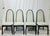 A striking set of four high-back dining chairs designed by Benny Linden. Renowned for minimalist Scandinavian elegance and...