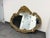 Design Plus Gallery presents a Rococo Style Wall Mirror from Marlock. The ornate frame surrounds shaped mirror glass with...