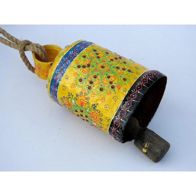 The bell is made of iron and coated primarily with copper, along with a few other metals. They are made from scrap iron...