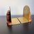 For your consideration a vintage modern pair of bookends brass and wood. No maker information. Dimensions: 6 w x 5.5 d x...